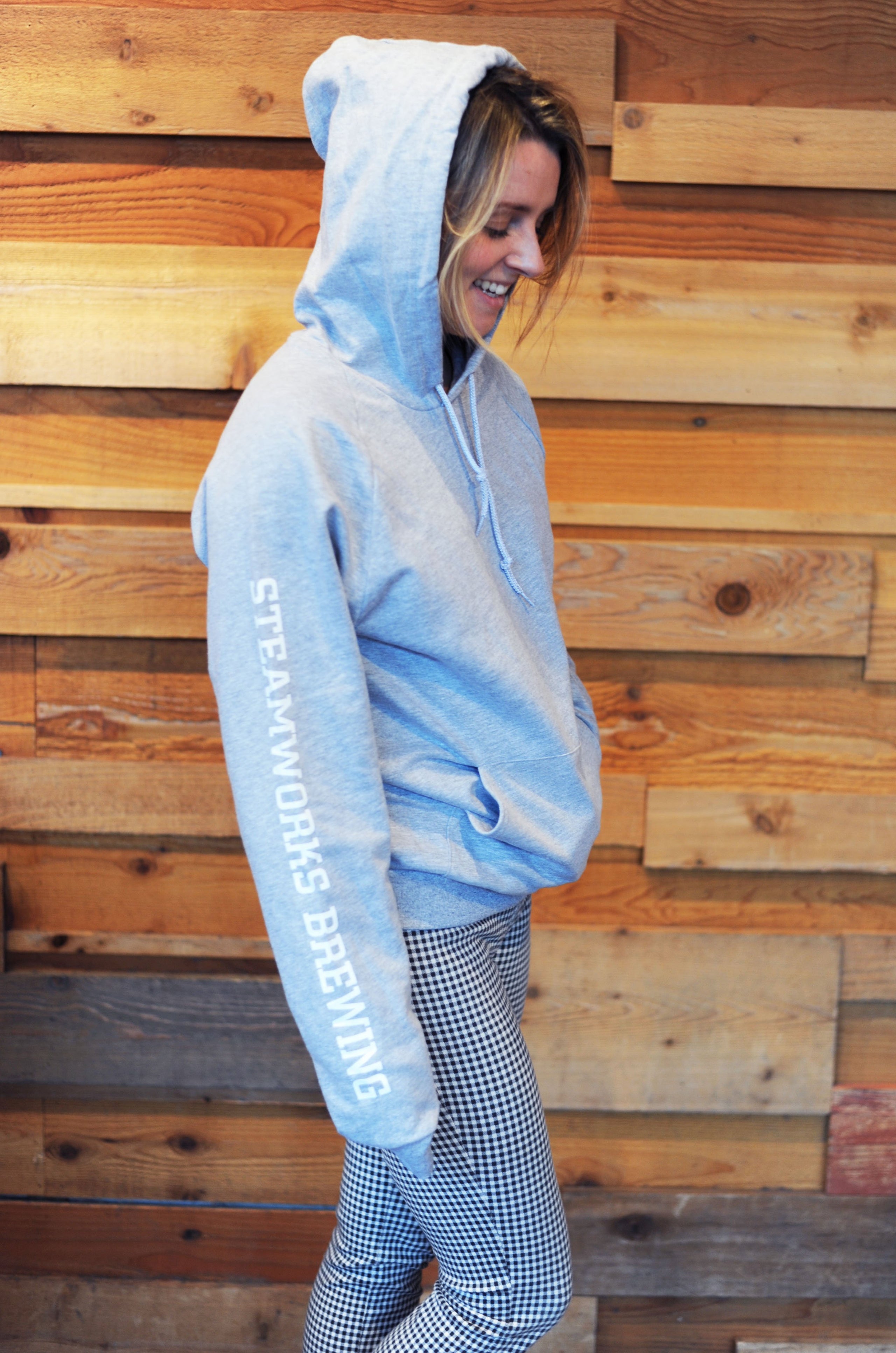 Grey hoodie with white writing shop